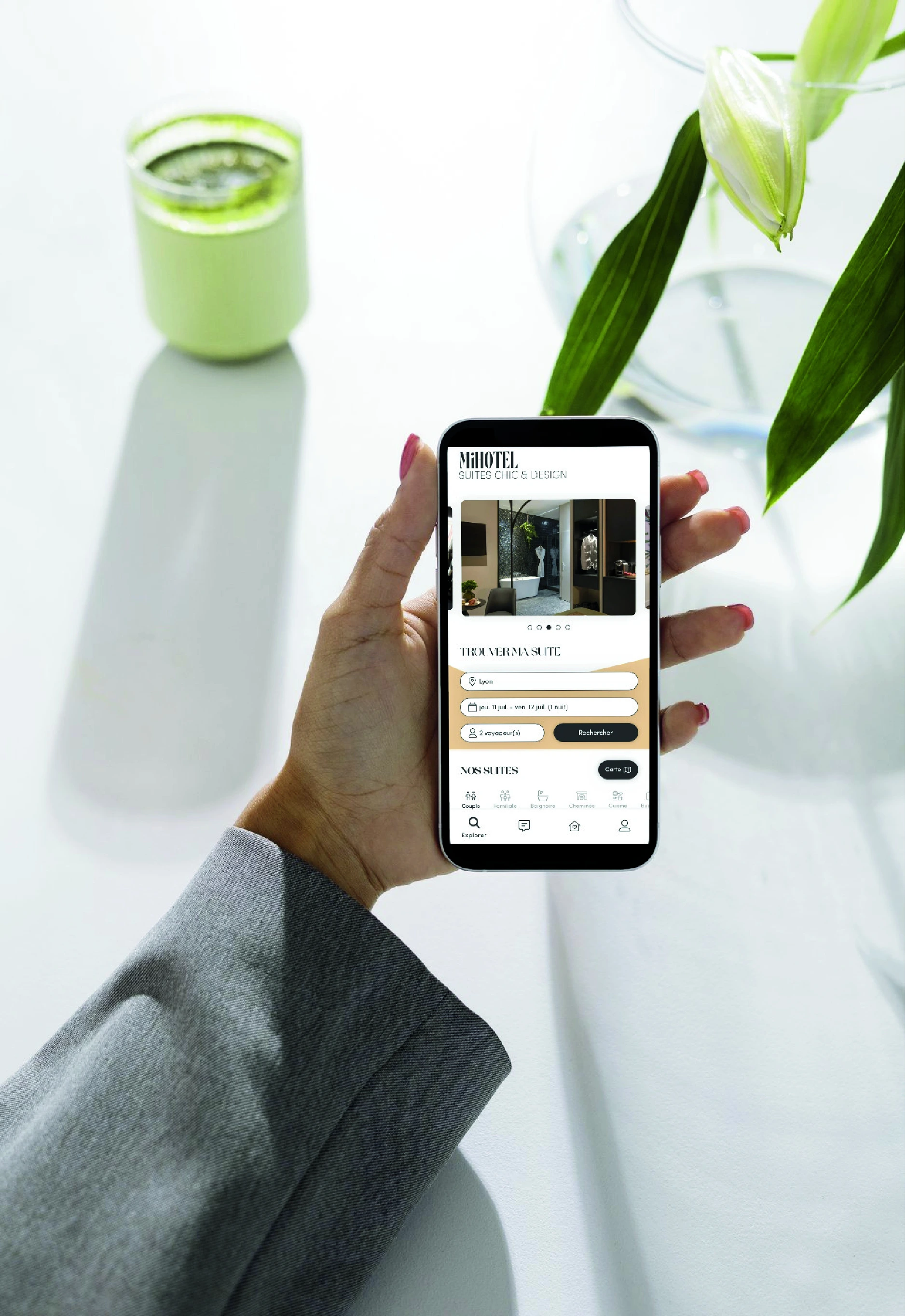 Hand holding phone with app